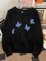 Pull Moelleux Noir à Motifs Papillons Bleus — Esprit Modern Casual