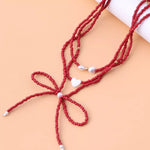 Collier Perles Nœud & Pendentifs Cœur