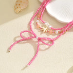 Collier Multi-Rangs Perles, Nœud & Étoile De Mer